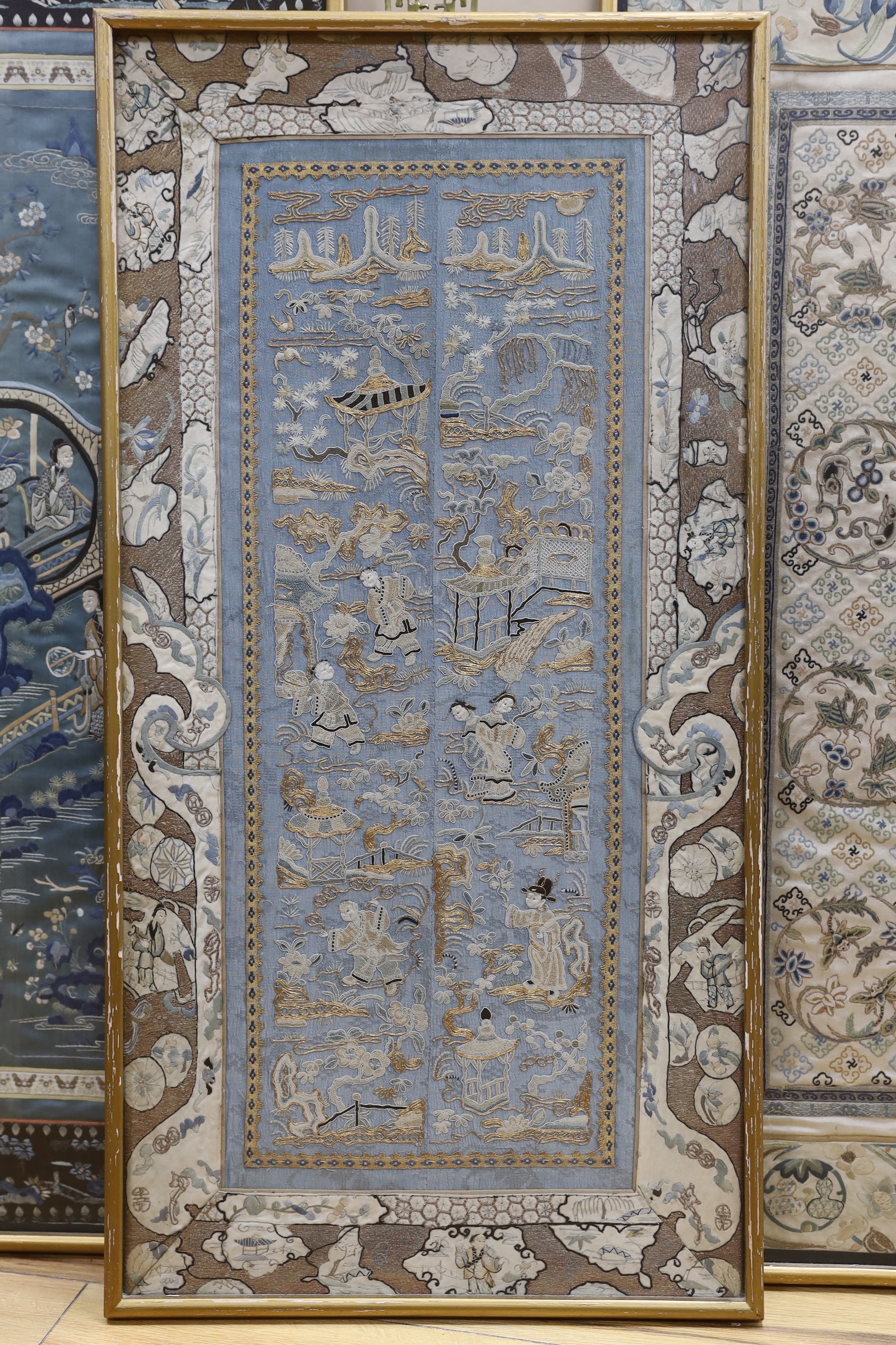 Three framed pairs of 19th century Chinese silk embroidered sleeve bands, two pairs worked in Chinese knot, largest 36cm wide, 72cm high